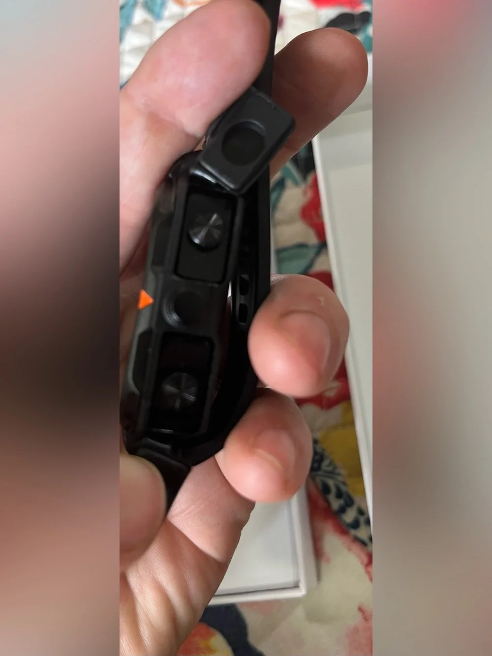 Sport Rugged Smartwatch and earbuds in Black with Orange Accents